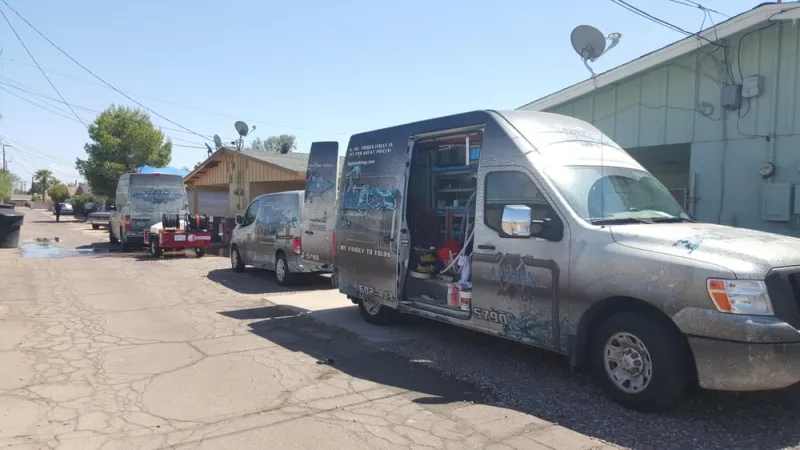 Lawson Family Plumbing fleet of service vans ready for service across Arizona